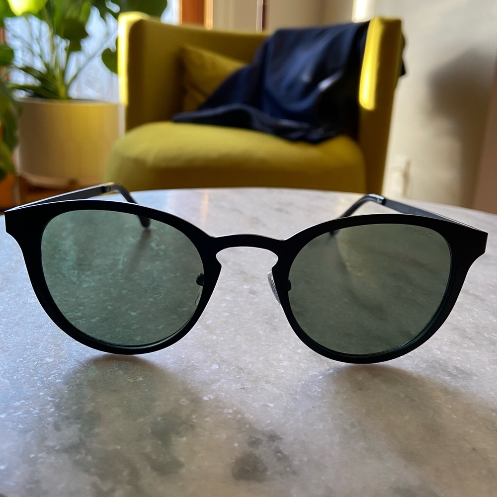 Brand New KOMONO The Hollis sunglasses black metal frames with green tint.